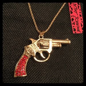 Like new BETSEY JOHNSON hold & red gun necklace